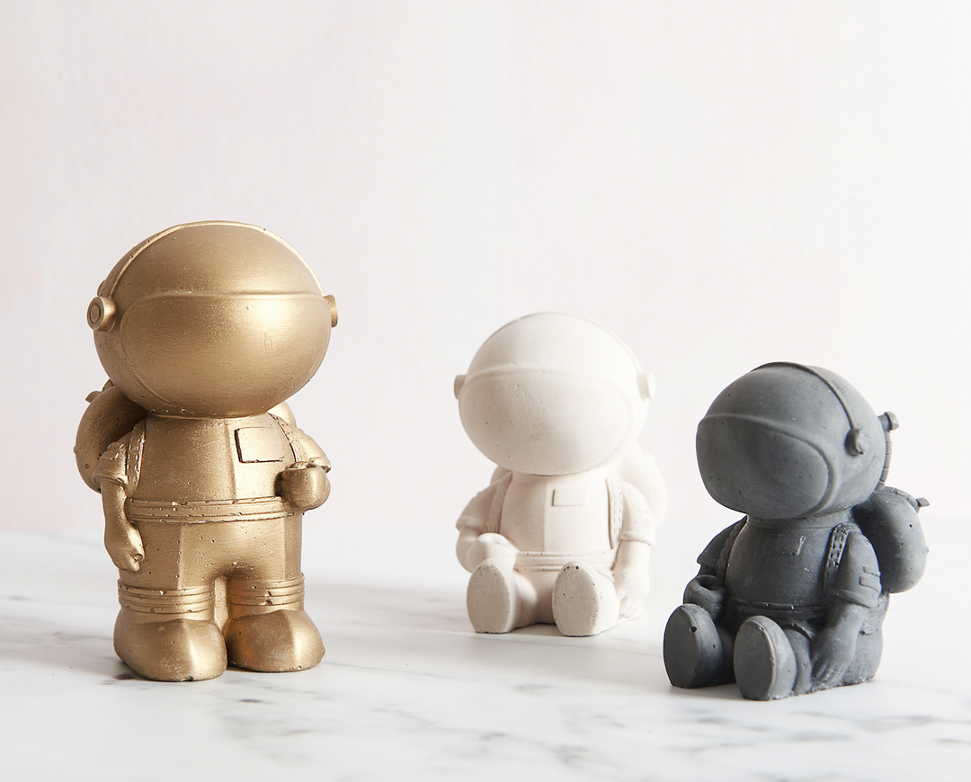 concrete 3d astronaut figures