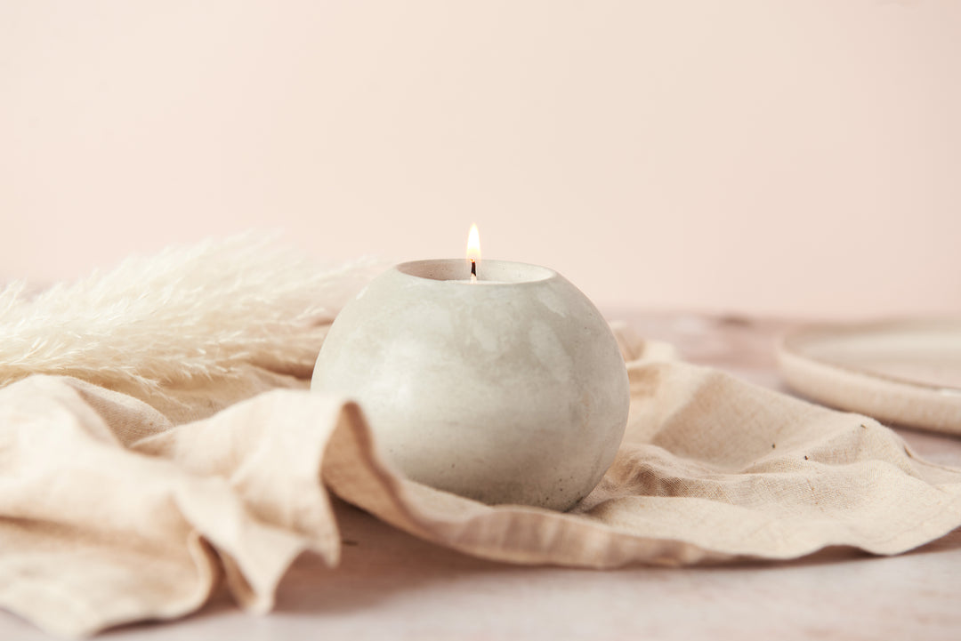 Spherical concrete tea light holder