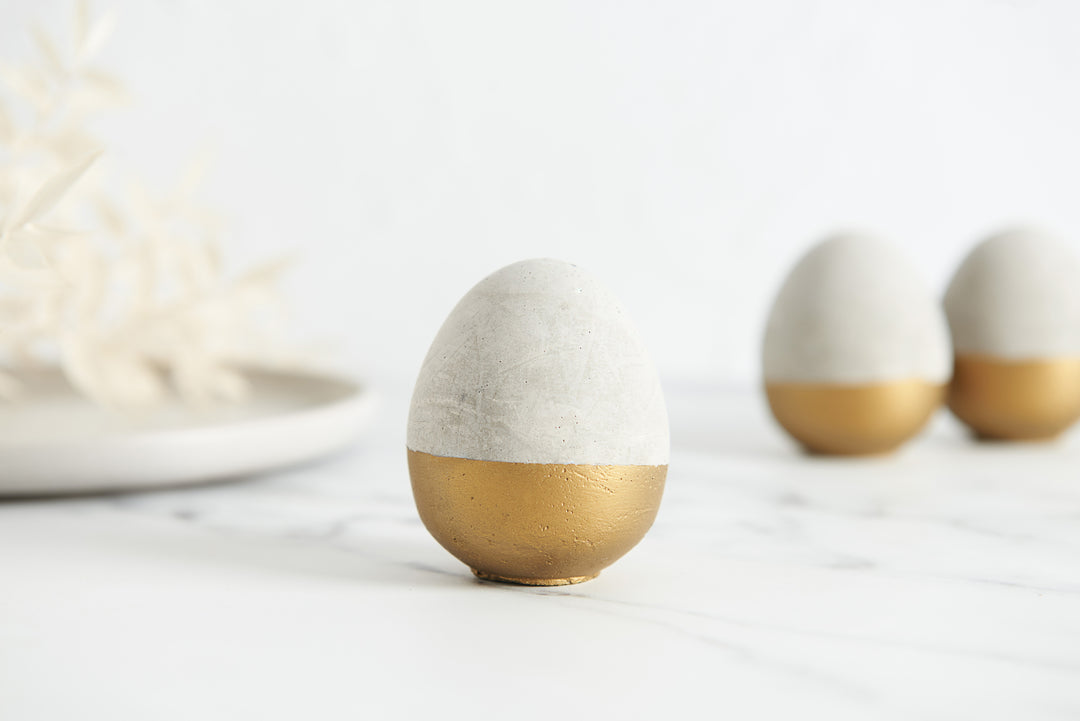 3D Gold and Raw Concrete Eggs