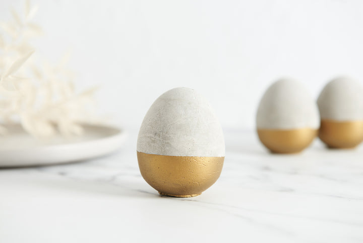3D Gold and Raw Concrete Eggs