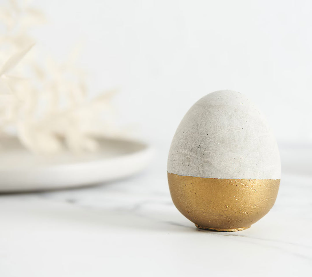 3D Gold and Raw Concrete Eggs